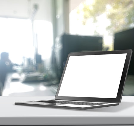 3d Laptop computer with blank screen on laminate table and blurred background