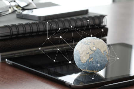 hand drawn texture globe with blank social media diagram on digital tablet computer as internet concept and bokeh exposureの写真素材