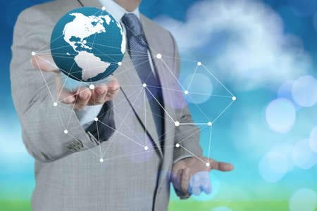 Double exposure of businessman working with new modern computer show social network structure as conceptの写真素材