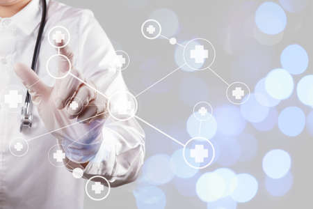smart medical doctor hand showing network with bokeh exposure as medical network and media conceptの写真素材