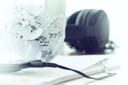 composing music concept with shallow DOF evenly matched jack of headphone and copy spaceの写真素材