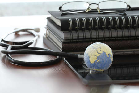 hand drawn texture globe with blank social media diagram on digital tablet computer as internet concept and bokeh exposure の写真素材