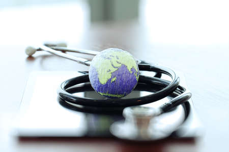 hand drawn texture globe with blank social media diagram on digital tablet computer as internet concept and bokeh exposure Elements of this image furnished by NASAの写真素材