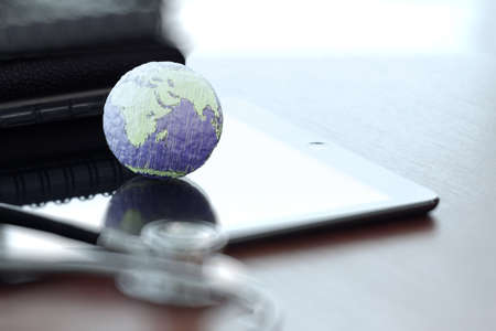 hand drawn texture globe with blank social media diagram on digital tablet computer as internet concept and bokeh exposure Elements of this image furnished by NASAの写真素材