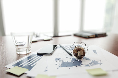 wooden texture globe with social media diagram on business document in office desk  as internet conceptの写真素材