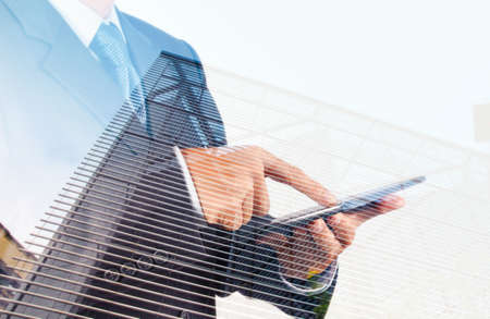 Double exposure of success businessman with abstractの写真素材
