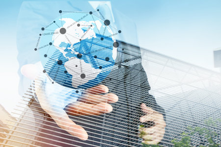 Double exposure of businessman working with new modern computer show social network structure as conceptの写真素材