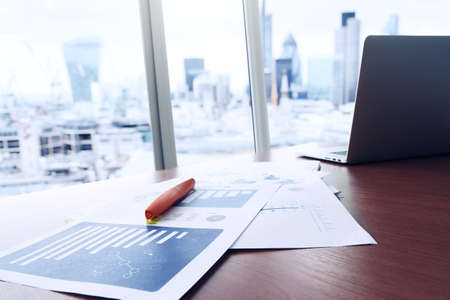 business documents on office table with smart phone and digital tablet as work space businessの写真素材