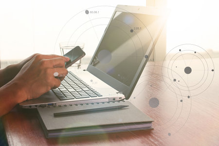 business documents on office table with smart phone and digital tablet and graph business diagram...