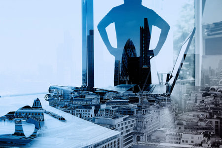 Double exposure of businessman working with new modern computer show social network structure as...