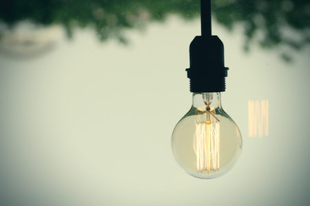 Close up of vintage light bulb as creative concept