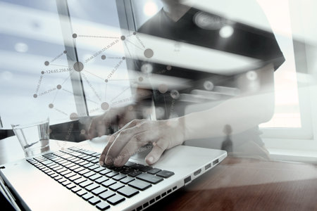double exposure of Young creative designer man working at office with computer laptop with social...