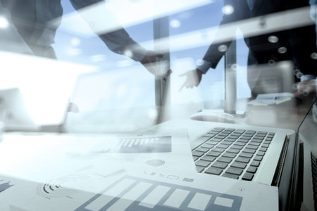 double exposure of business documents on office table with smart phone and digital tablet and stylus...