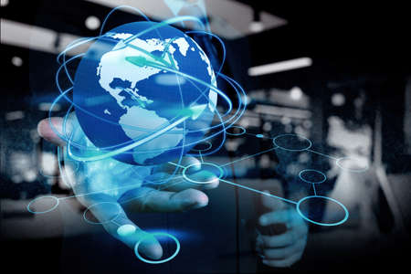 double exposure of businessman hand holds social network as conceptの写真素材