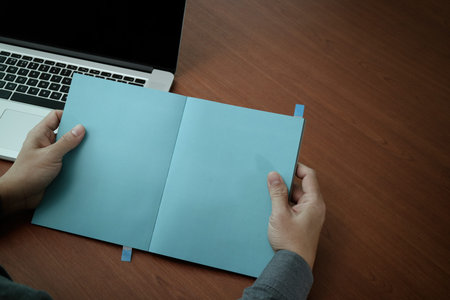 top view of Double exposure of businessman hand working with new modern computer and business...