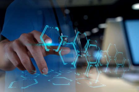 Double exposure of Medicine doctor hand working with modern computer interface as medical concept Double exposure of Medicine doctor hand working with modern computer interface as medical concept