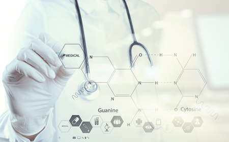 Double exposure of chemist doctor hand drawing chemical formulas on virtual boardの写真素材