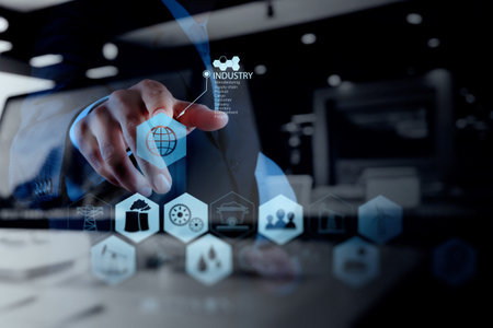 Double exposure of businessman hand working with new modern computer and business strategy as...