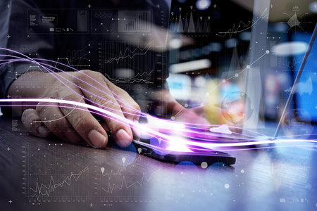 Waves of blue light and businessman using on smartphone with digital layer effect as concept