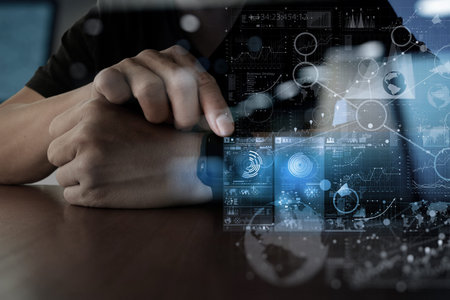 Businessman hand using mobile phone with digital layer effect as business strategy concept