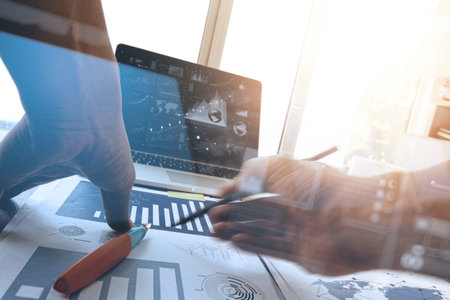 businessman hand working with new modern computer and business strategy as concept