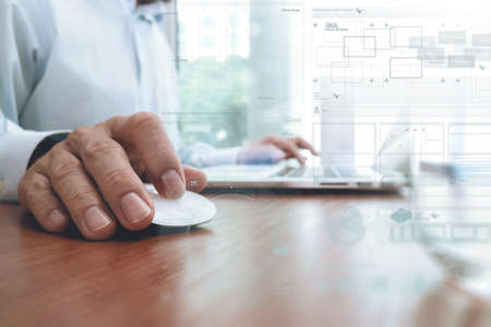 businessman hand working with modern technology and digital layer effect as business strategy conceptの写真素材