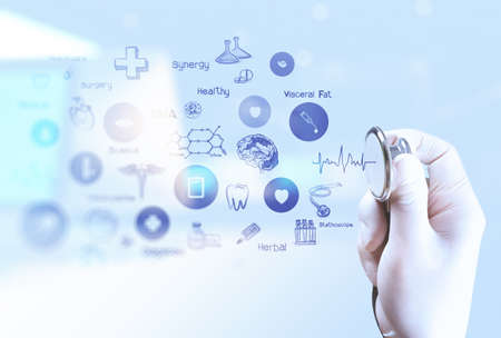 double exposure of Medicine doctor hand working with modern computer interface as medical conceptの写真素材