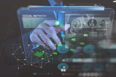 double exposure photo of businessman working with new modern computer show social network structure as conceptの写真素材