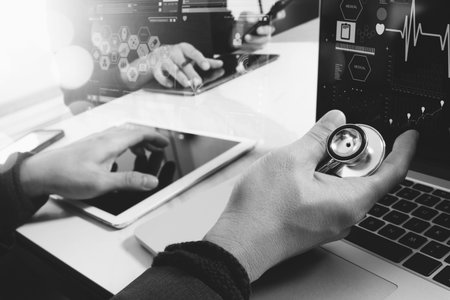 Medical technology network team meeting concept. Doctor hand working smart phone modern digital...