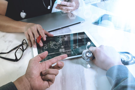 Medical technology network team meeting concept. Doctor hand working smart phone modern digital...