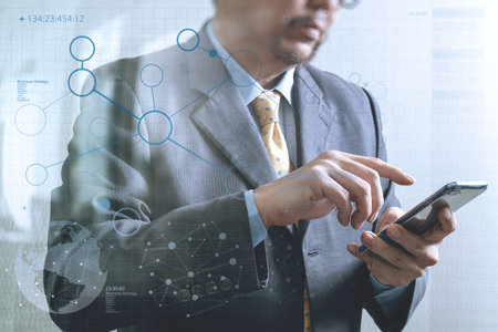 success businessman using smart phone,front view,filter effect,business strategy icons interface