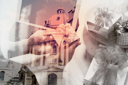 Double exposure of Creative choosing gift with digital tablet computer docking smart keyboard on mable desk,London buildingsの写真素材