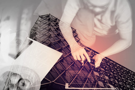 double exposure of hipster hand using digital tablet docking keyboard and smart phone for mobile...