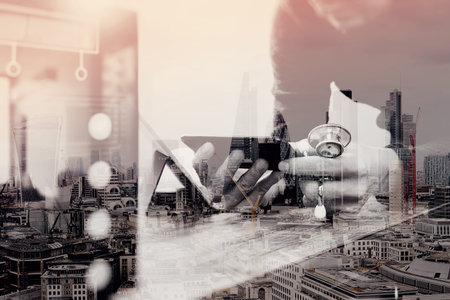 medical doctor hand working with smart phone,digital tablet computer,holding stethoscope,compact server on wood desk,London architecture cityの写真素材