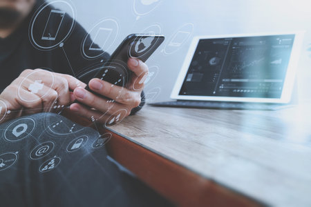 businessman hand using smart phone,mobile payments online shopping,omni channel,digital tablet...