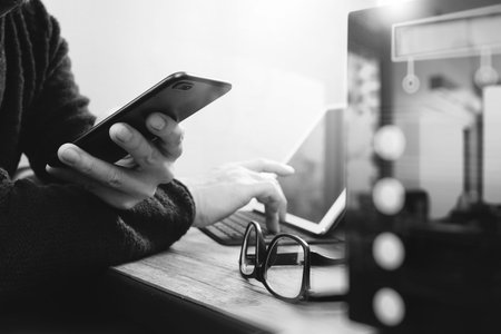 businessman hand using smart phone,mobile payments online shopping,omni channel,digital tablet...