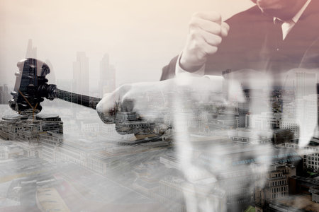 double exposure of justice and law concept.Male judge in a courtroom with the gavel,working with...