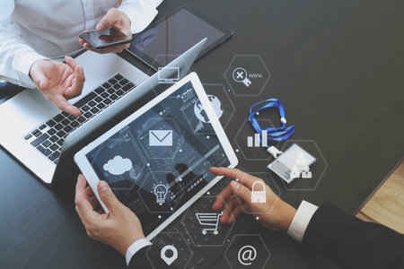 co working team meeting concept,businessman using smart phone and digital tablet and laptop computer...