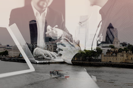 Medical and health care concept,Doctor meeting with his team in modern office at hospital with London city exposureの写真素材