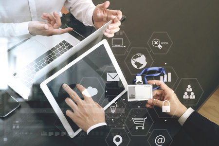 co working team meeting concept,businessman using smart phone and digital tablet and laptop computer...