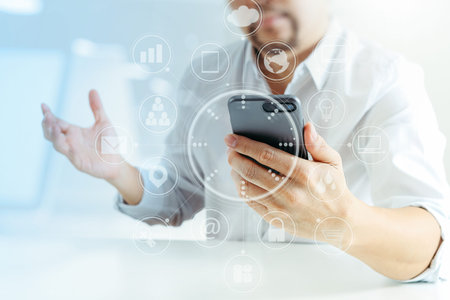 Big data analytics with business intelligence (BI) concept. businessman using mobile phone and...