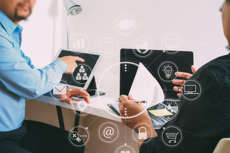 co working team meeting concept,businessman using smart phone and digital tablet and laptop computer...