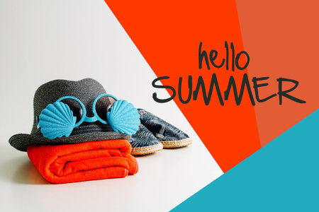 Summer holiday travel concept.Hipster Beach items for a day at the seaside  with hello summer word...