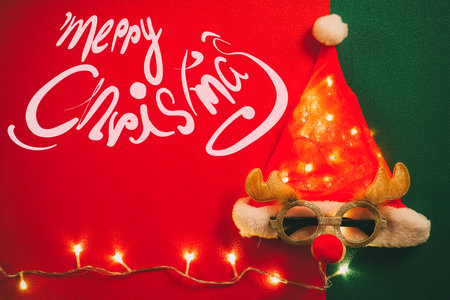 Greeting Season concept.Santa Claus hat with star light and glasses that decoration with Christmas...
