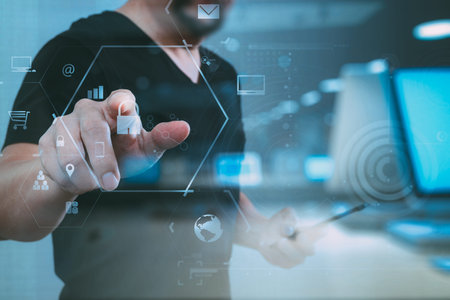 cyber security internet and networking concept.Businessman hand working with VR screen padlock icon...