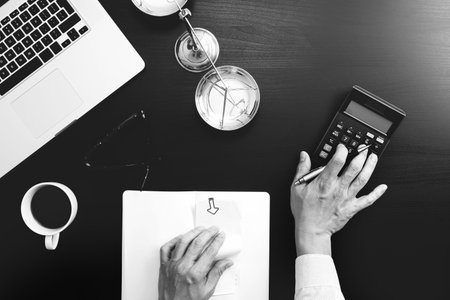 Justice and law concept.businessman or lawyer or accountant working on accounts using a calculator...
