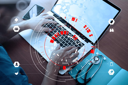 Medical techonlogy concept,smart doctor hand working with modern computer in hospital office with...