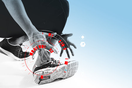 Runner sportsman holding ankle in pain with Broken twisted joint running sport injury and Athletic...