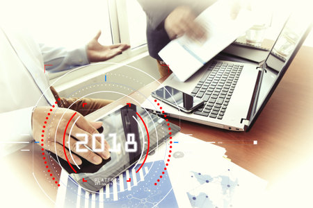 Businessman focus on year 2018 with Target lcked HUD dashboard. Business new year technology...