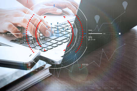 Concept of target focus digital diagram,graph interfaces,virtual UI screen,connections netwoork.Hipster finance analist working at trendy officeの写真素材